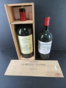 A Chateau St Didier-Parnak 5ltr green glass wine bottle in original box (contents deficient).