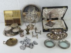 A quantity of silver plated wares inc brandy warmer, coasters, sauce boat, candlestick, trays, etc.