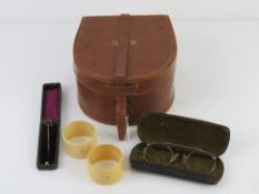 A hunting themed stock pin having yellow metal terminal in the form of a stirrup within original