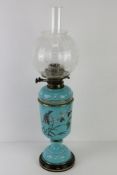 A late 19th century handpainted blue opaline glass oil lamp, burner marked for Hinks Duplex Patent,