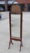 A reproduction mahogany cheval mirror and stand, 166cm high.