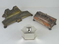 An Art deco desk standish having two inkwells over pen tray,