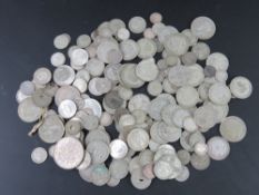 A quantity of pre-1947 coinage mostly half silver, some full silver noted. Total weight 1040.