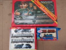 Three Hornby train sets including Thomas the Tank Engine.
