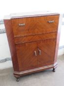 A early 20th century cantilever cocktail and drinks cabinet,