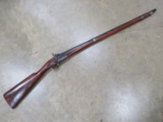 A mid 19th century Indian percussion two band musket with brass butt plate and trigger guard,