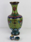 A 20thC Cabachon enamel cloisonné vase in blues and greens and having five toad dragons upon