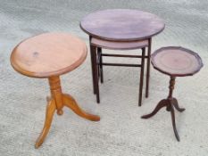 A nest of two tables together with a wine table and a pine occasional table.