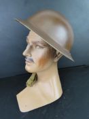 A WWII British Army helmet c1940.