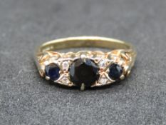 A 9ct gold sapphire and diamond ring,