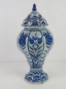 A blue and white ginger jar standing approx 33cm high having blue glaze, slightly a/f.