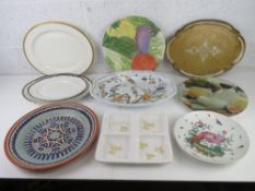 A quantity of assorted decorative serving dishes inc contemporary lazy Susan type cheese board,