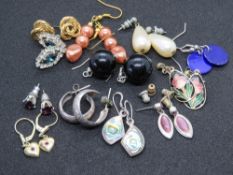 A quantity of silver and costume jewellery earrings.
