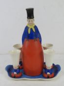 A German Pottery Schnapps set comprising four cups and bottle upon tray.