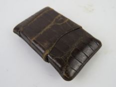 A vintage alligator skin cigar case approx 7 x 13cm.