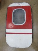 A Boeing 707 emergency exit door bearing parts label.