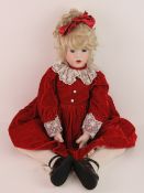 A handmade 20th century bisque headed doll made using an antique doll mould,