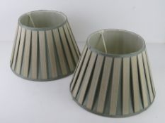 A pair of green and cream silk lamp shades 36cm dia.