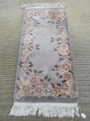 A woolen runner, 164 x 70cm.