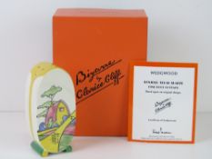 A Clarice Cliff design later produced by Wedgwood; Bonjour Sugar Shaker, in box with certificate,