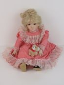 A handmade 20th century bisque headed doll made using an antique doll mould,