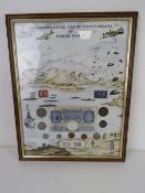 A montage including coinage 'Commemorating the 50th Anniversary of World War II', framed.