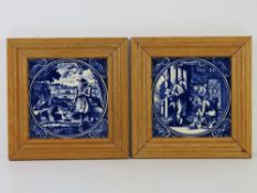 A pair of blue and white Delpht pottery tiles in frames 'De Landman' and ''De Schoenmaaker'.