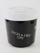 A late 20th century ice bucket having brand names upon inc Black & White Scotch Whiskey and Booth's