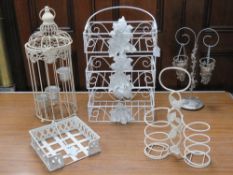 A quantity of decorative metal items including bird cage, napking holder, 3 tier shelf unit.