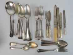 A small quantity of silver plated flatware including mother of pearl handled knives,
