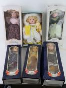 Six contemporary porcelain dolls in boxes.
