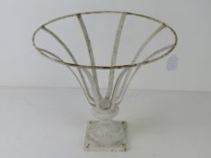 A white painted metal planter stand, 35.5cm dia at widest.