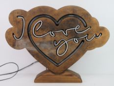 A wooden heart shaped neon light 'I Love You', non-uk-standard plug, for rewiring.