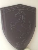 A smokey Perspex Ferrari-themed wall sign C1970s featuring the Cavallino Rampante upon,
