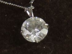 A 9ct white gold diamonique pendant and chain.
