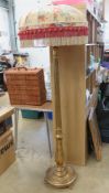 A gold painted standard lamp with silk floral shade upon, all standing 176cm high,