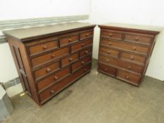 A suite of two matching chests of drawers, one large one small,