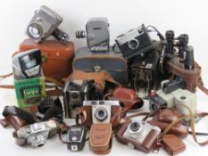 A large quantity of vintage cameras and photographic equipment inc Six-16 Brownie,