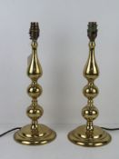 A pair of brass table lamps, 38cm high.