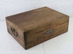A twin handled pine toolbox bearing label Taylor-Hobson Leicester measuring approx 50 x 36.5 x 17.
