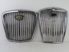 Two vintage Wolseley car grills, chromed, badges a/f, the larger being 43cm at widest, the other 34.