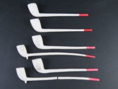 A quantity of six contemporary clay pipes.