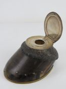 A HM silver horse hoof inkwell having brass 'shoe', cut glass inkwell, hallmarked London 1897,