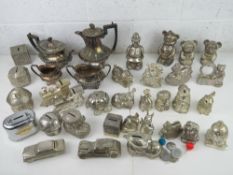 A silver plated tea set together with a large quantity of silver plated money boxes.