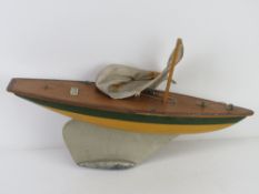 A model pond yacht hull bearing label 'Ailsa Yacht' a Milbro Product made in Scotland approx 47cm
