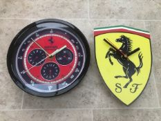 Two Ferrari-themed contemporary small wall clocks, both having Quartz movements,