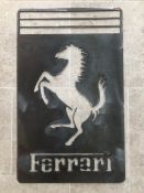 A Ferrari-themed lazer-cut wall sign formed from 4mm steel sheeting. Measuring 30 x 42cm.