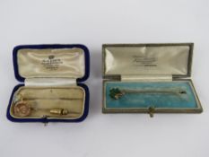 Three stock pins within two vintage boxes; Guilloche enamel art nouveau with seed pearl stamped 9c,