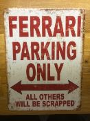A small novelty aluminium 'Ferrari Parking Only' wall sign, 'aged' and having corner fixing holes,