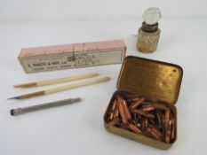 A HM silver and cut glass perfume bottle together with a quantity of vintage pens and pen nibs.